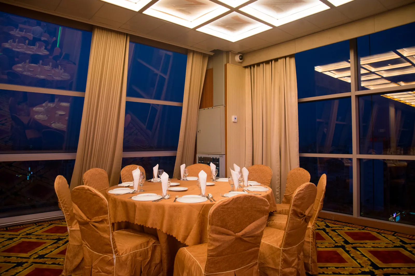 Intimate dining setup at ZamZam Convention Center with city views