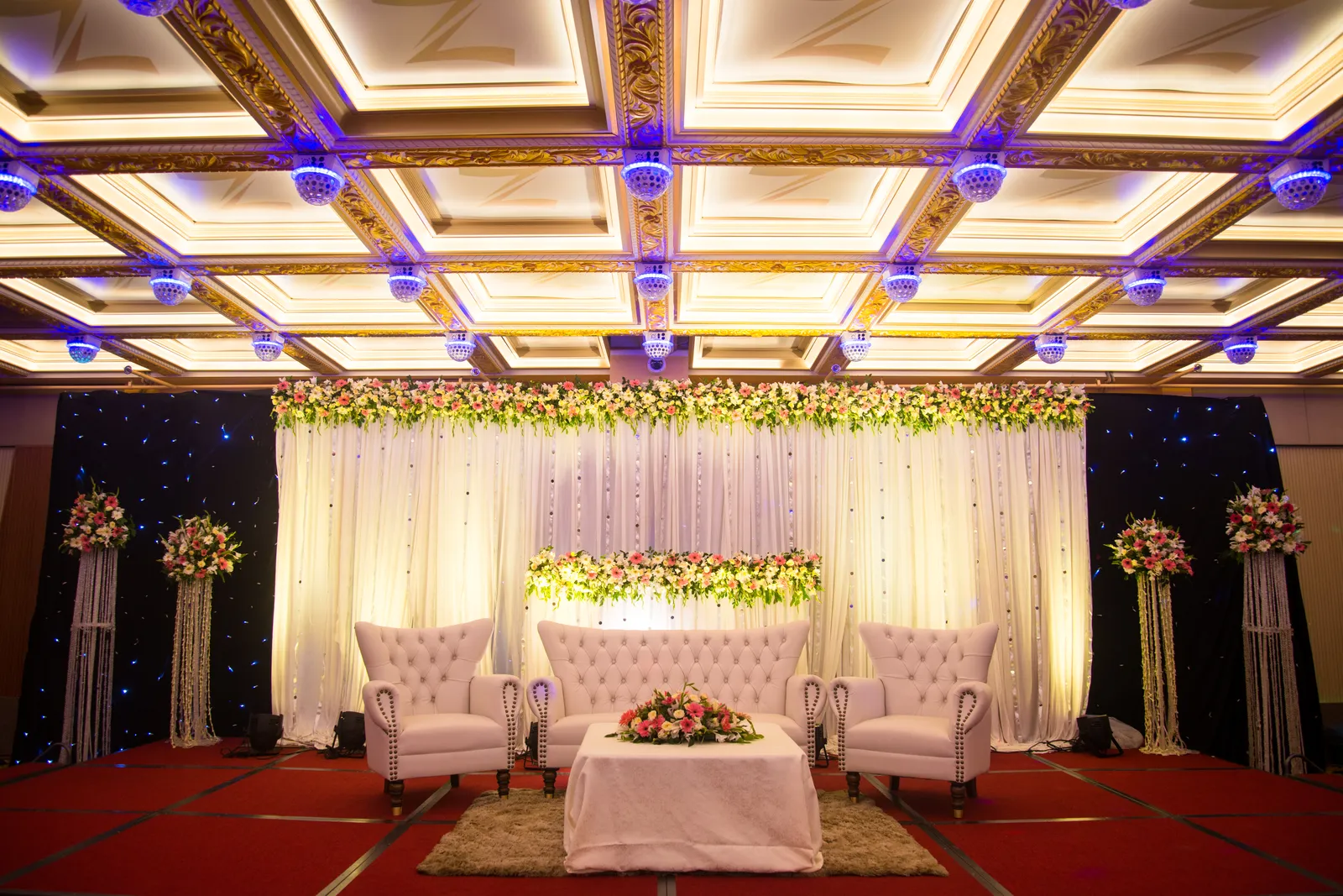 Wedding stage setup at ZamZam Convention Center with floral decor and elegant seating